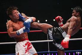 Buakaw teeps Masato in the face 
